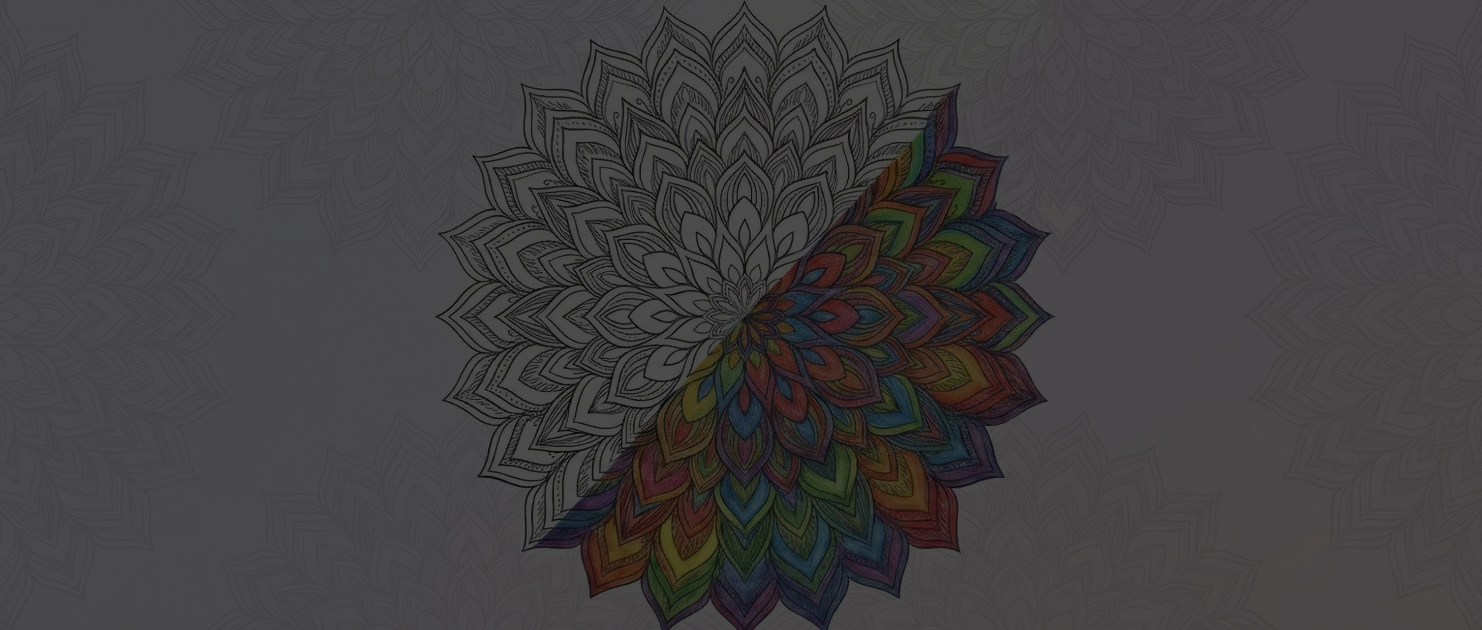 Half-colored mandala coloring page in progress, with rainbow hues. Free printable adult coloring.